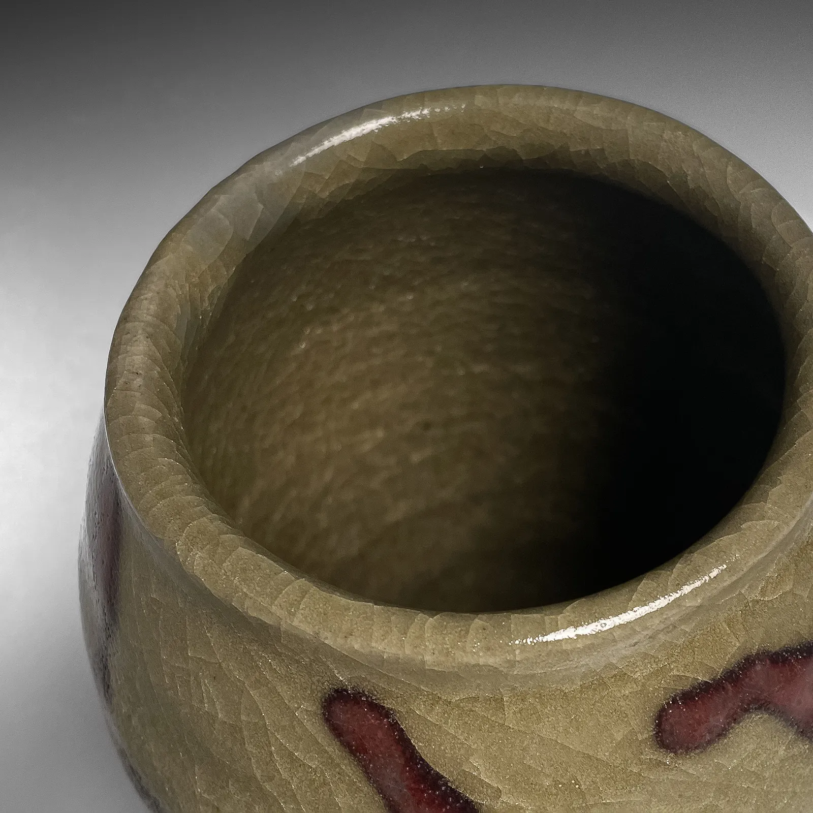 ISHIGURO MUNEMARO, Conical vessel patterned in iron-oxide brushed design over green celadon glaze, ca. 1967