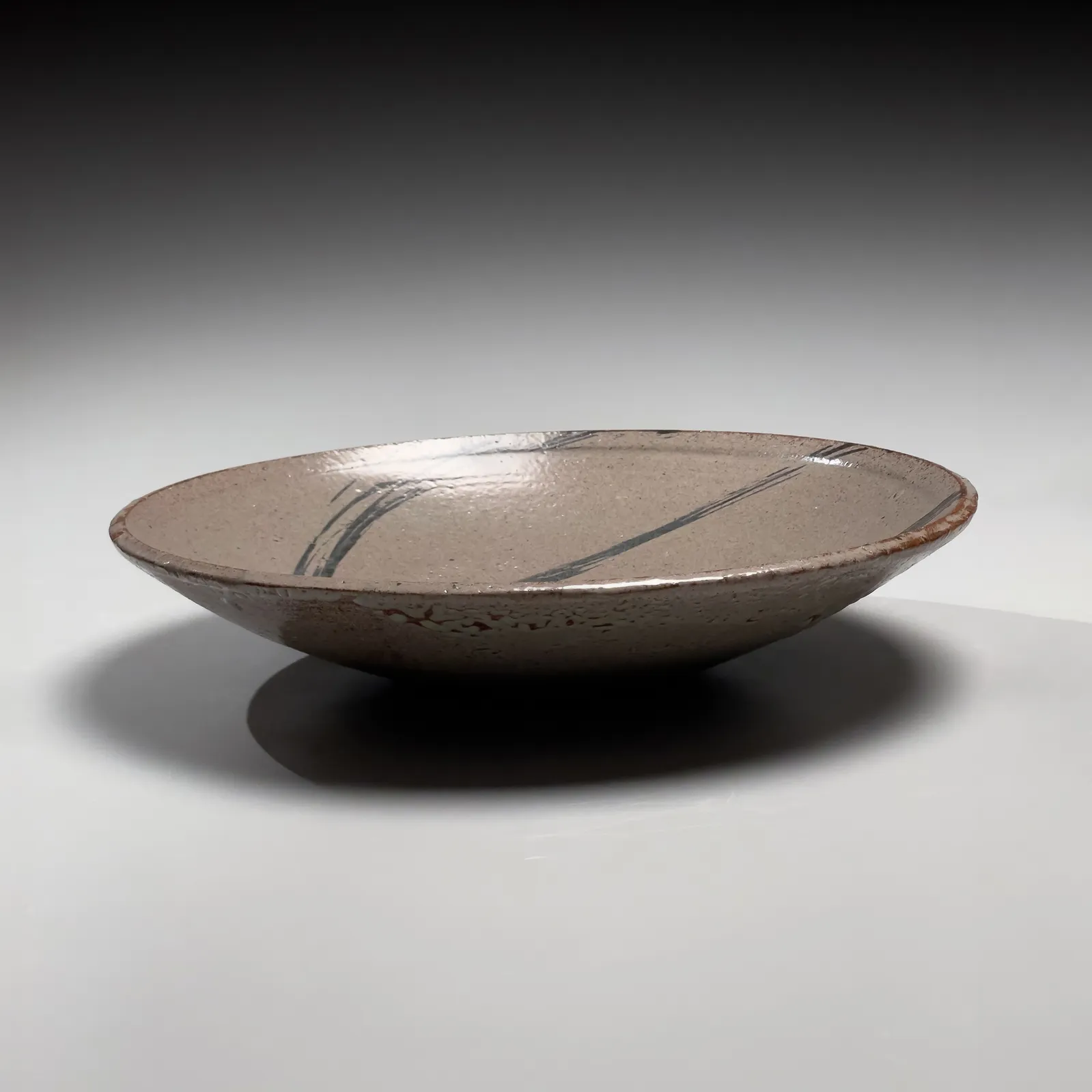 ISHIGURO MUNEMARO, Platter with motif of cricket and grasses in iron underglaze, ca. 1964–1966