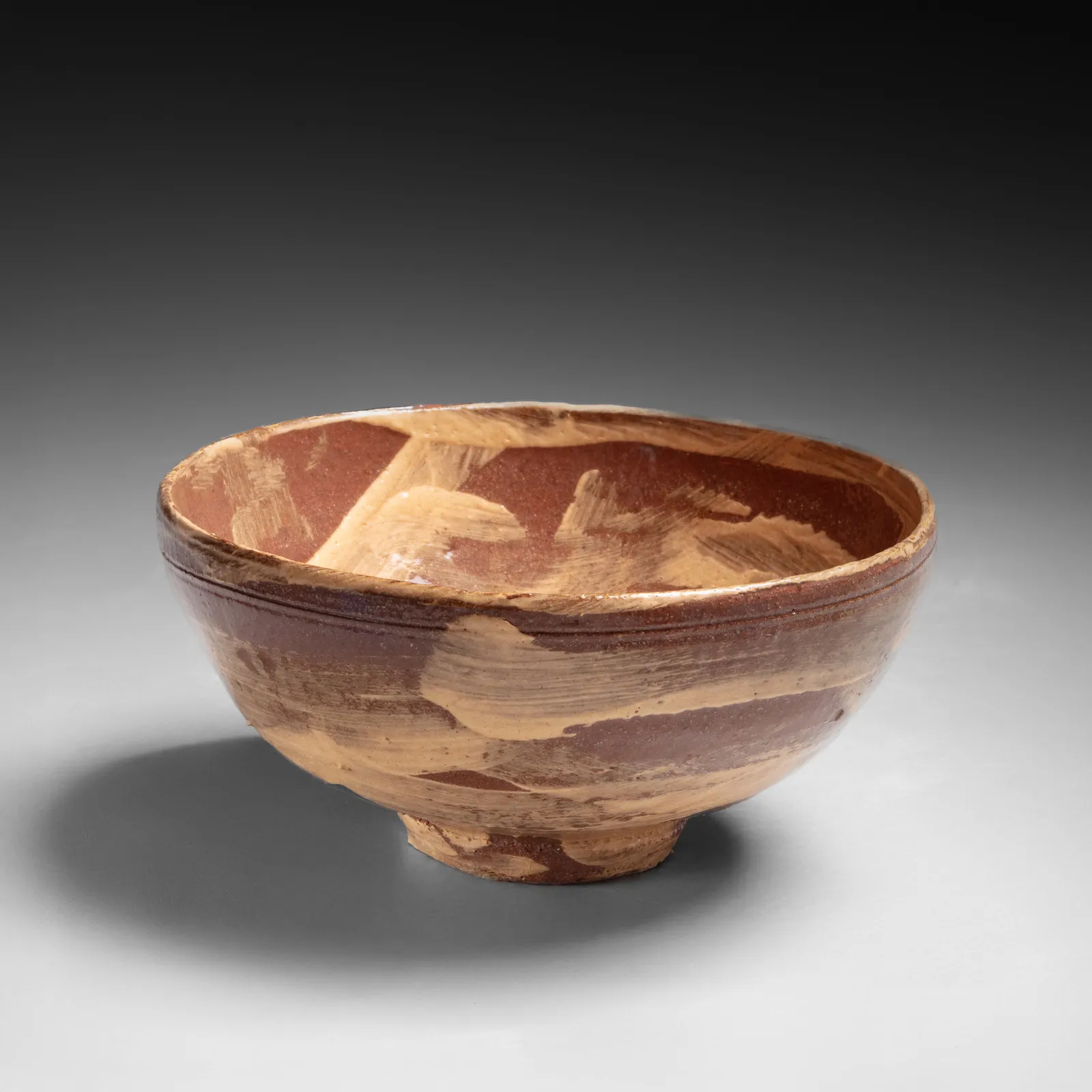 ISHIGURO MUNEMARO, Low, open teabowl with raised foot and yellow brushstroke (hakeme) patterning, ca. 1955