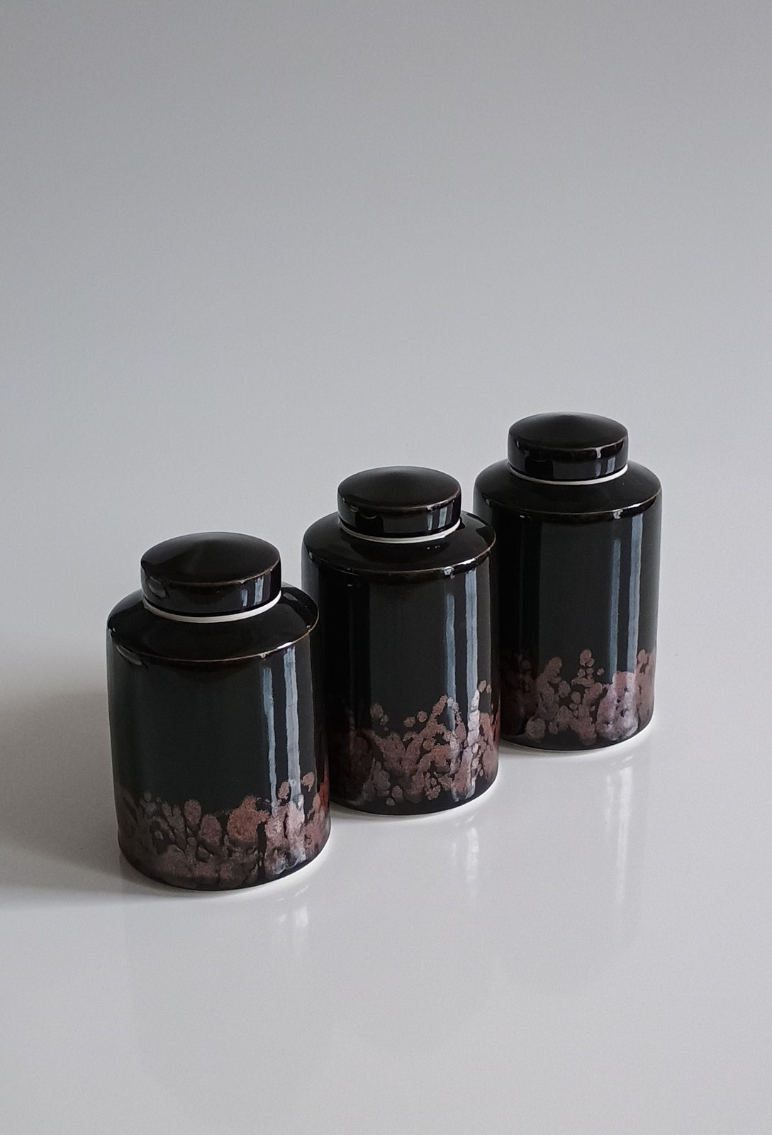 Chris Keenan, Tenmoku Lidded Jars with Red 'Writing' (largest), 2025