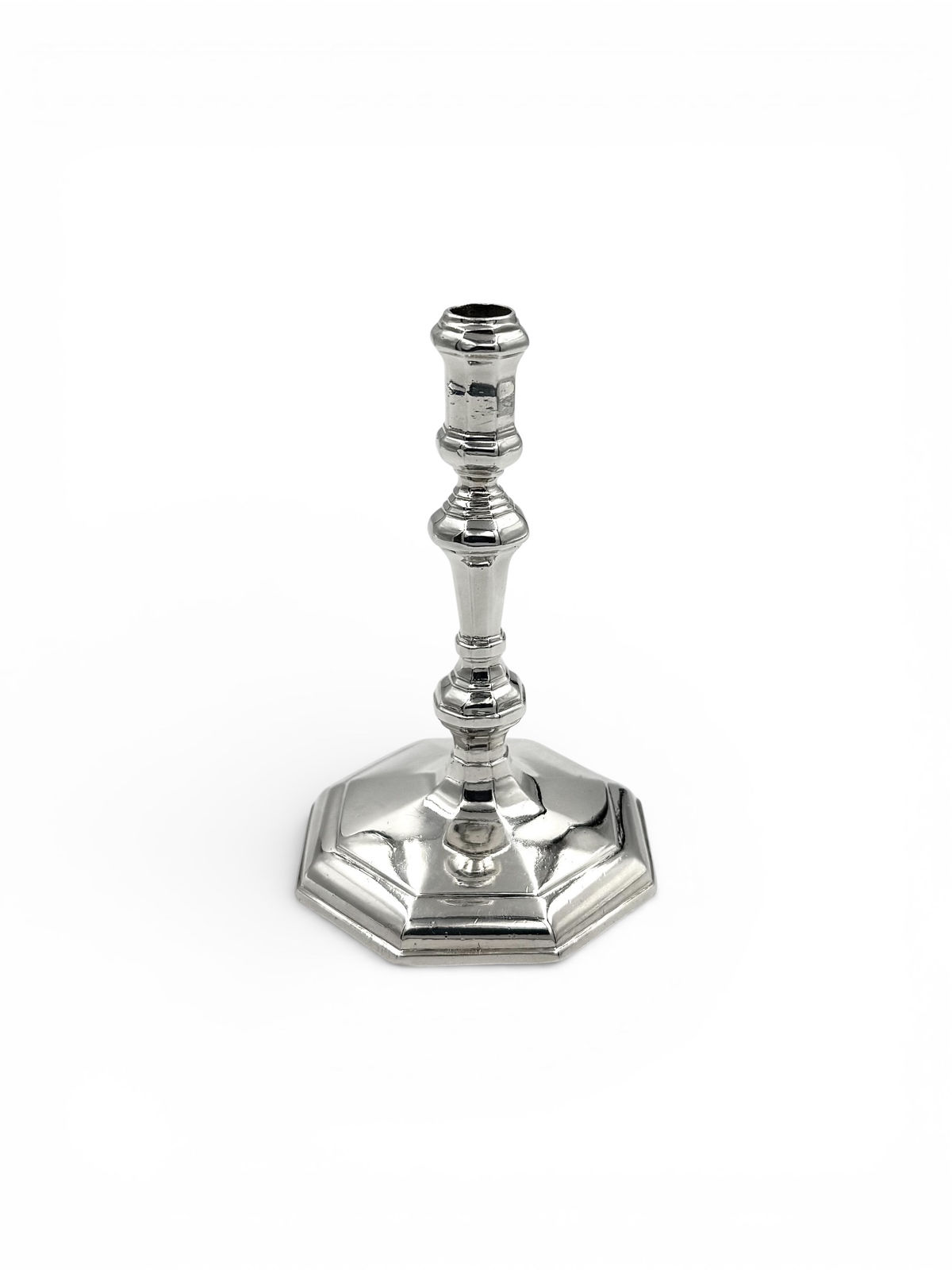 Thomas Fawler, A Queen Anne Octagonal Taperstick, 1710