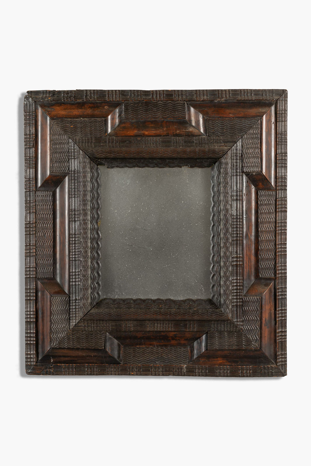 17th Century Italian Ebonised Ripple Framed Mirror