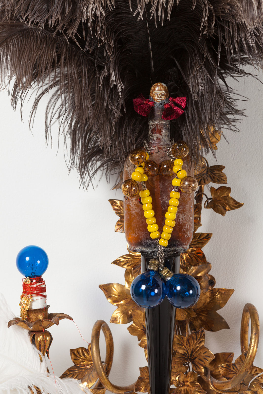 Rina Banerjee, Sex-bait, in likeness to fish bait to catch her as disloyalty in likeness to Eve, to arouse her fear, to create racial panic of black jewels like honey to stir and stir poisonous passions, minted money out lynching funny, 2017