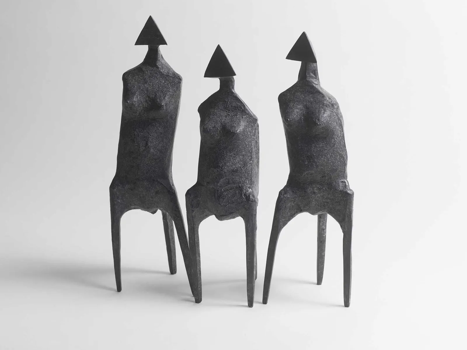 Lynn Chadwick, Three Standing Figures (C67), 1987
