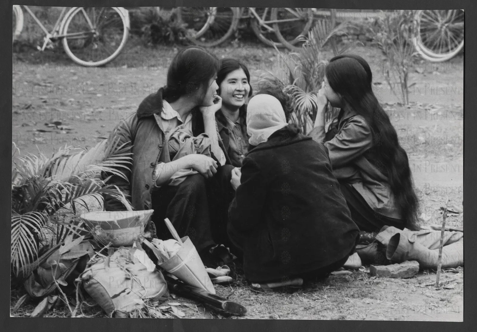 Militia girls take a break during an exercise in Hanoi.