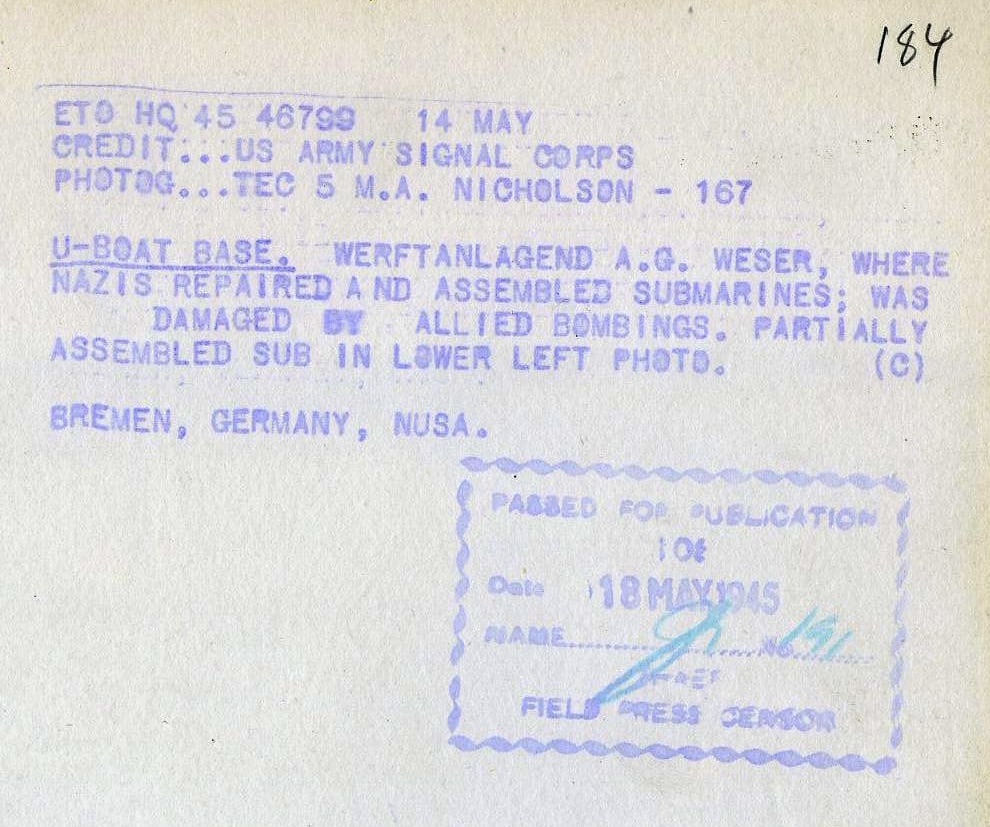 M.A. Nicholson, Captured German U-Boat Base in Werftanlagend A.G. Weser, Bremen, Germany. You can see a couple of submarines in the lower left 5.14.45 , 1945