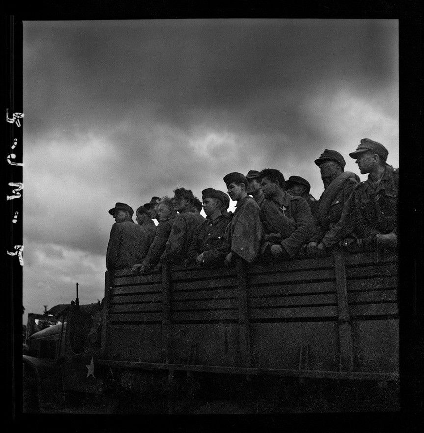 John G. Morris, #6 Vicinity of Saint-Lô, Manche, Normandy, July 27: German prisoners taken away by US troops