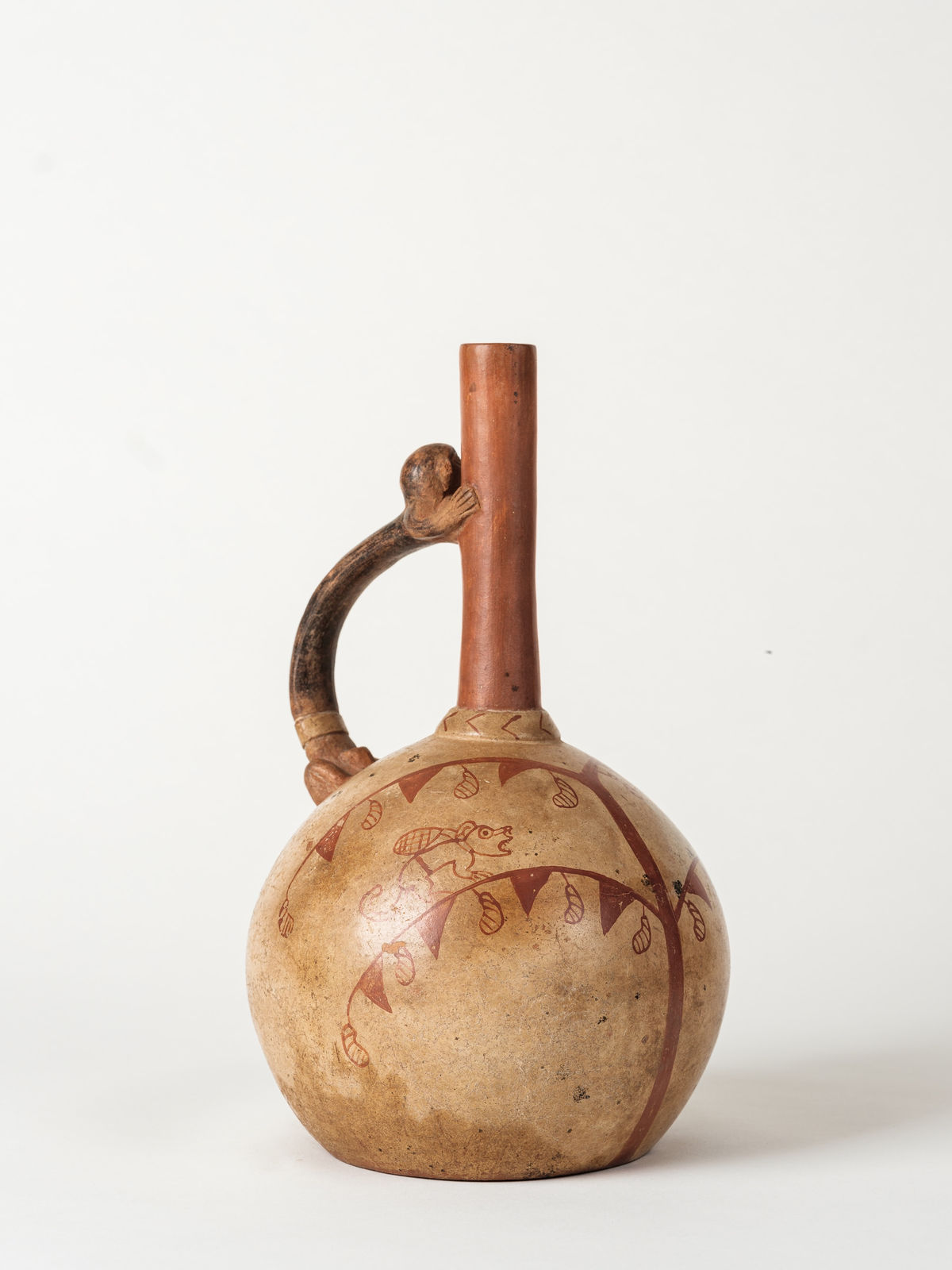 Moche Culture, Moche Fineline Stirrup Vessel Monkey on Handle, Circa. 400-700 AD