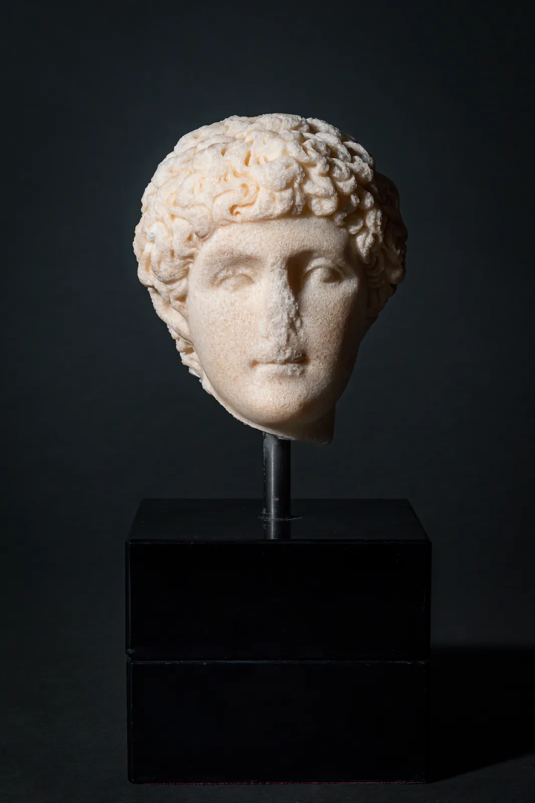 Greek small Marble Head of Ephebe, Ca. 3rd century BC