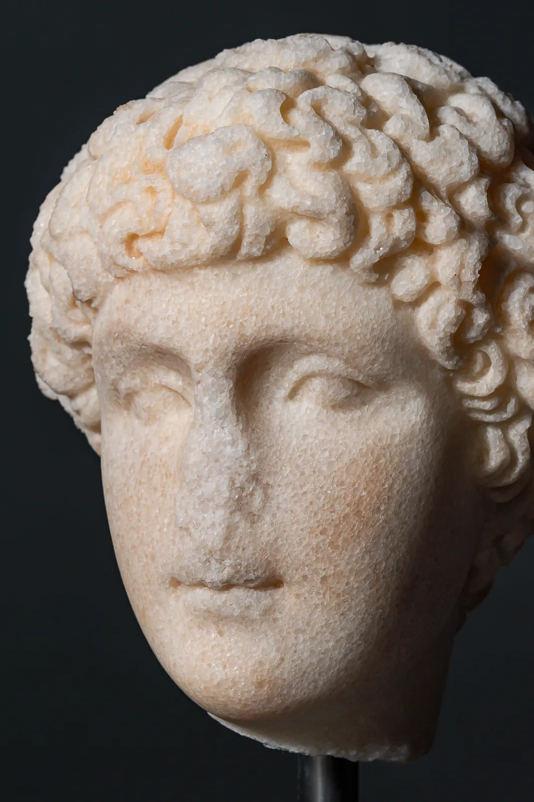 Greek small Marble Head of Ephebe, Ca. 3rd century BC