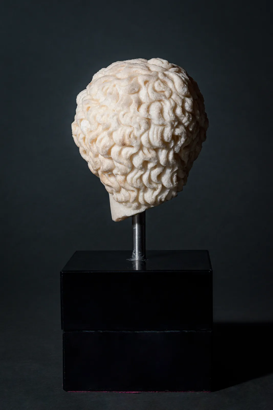 Greek small Marble Head of Ephebe, Ca. 3rd century BC