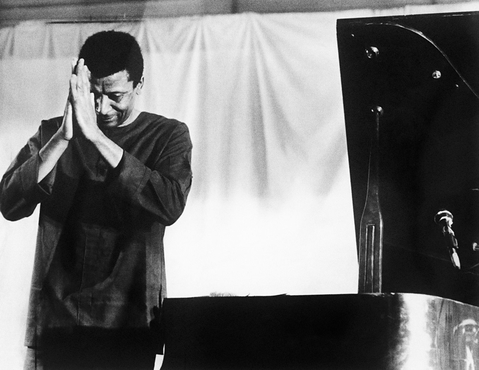 Alf Kumalo, Abdullah Ibrahim pays respects to the audience in a 1980s performance in Botswana