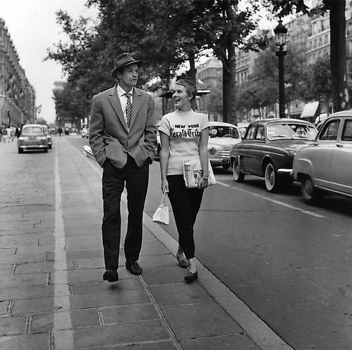 Raymond Cauchetier, Jean-Paul Belmondo and Jean Seberg off-set on the Champs Elysees "À Bout De Souffle", 1959