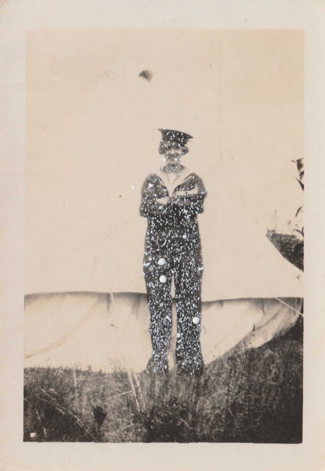 John Latour, Smiling young woman in uniform in front of a tent, 2021