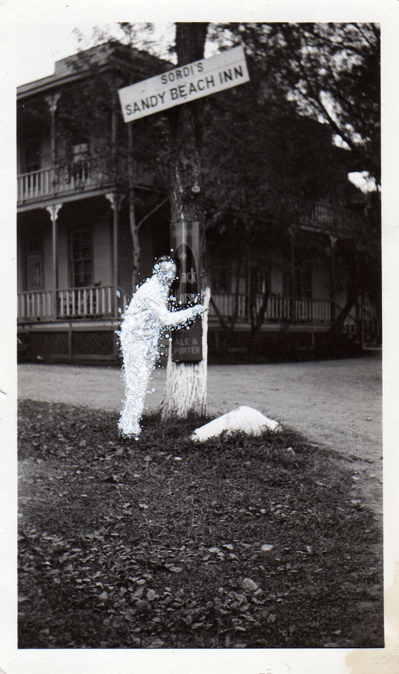 John Latour, Man in white hugging tree, 2008