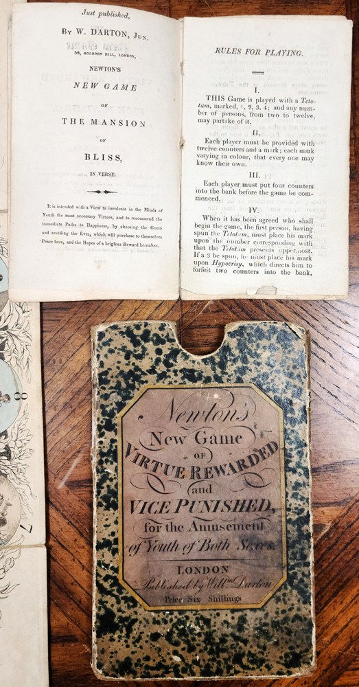 Newton's New Game of Virtue Rewarded and Vice Punished, for the Amusement of Both Sexes. Booklet text spread and slipcase