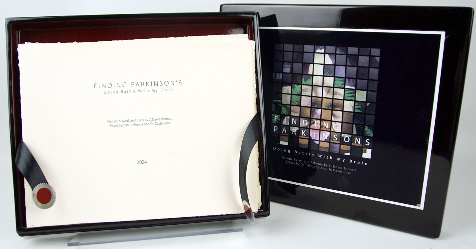 Finding Parkinson's. Doing Battle with My Brain by C. David Thomas. Title page and front of box