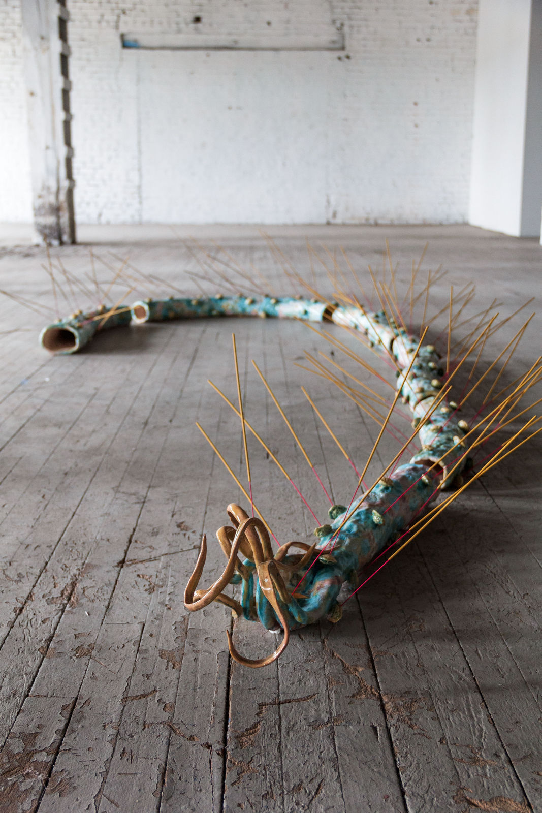 Cathy Lu, Nuwa's Arm with Incense (floor), 2022