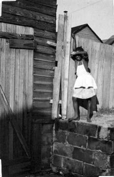 Helen Levitt, Untitled, New York (girl with arm over face), 1938
