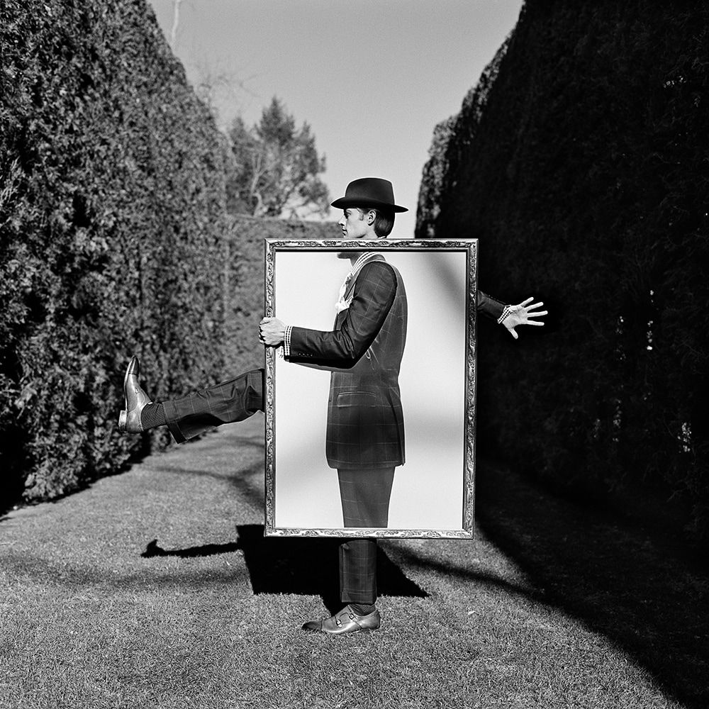 Rodney Smith, Nathan Holding Portrait of Himself, Amenia, New York, 2011