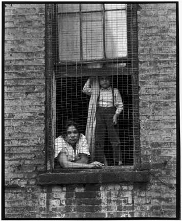 Bruce Davidson, Mother and Child Behind Chicken Wire Fence, 1966-68