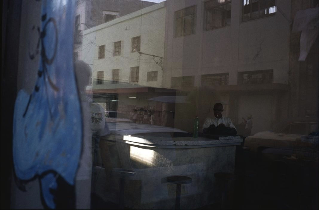 Alex Webb, Havana, Cuba (man/cafe/reflection), 2005
