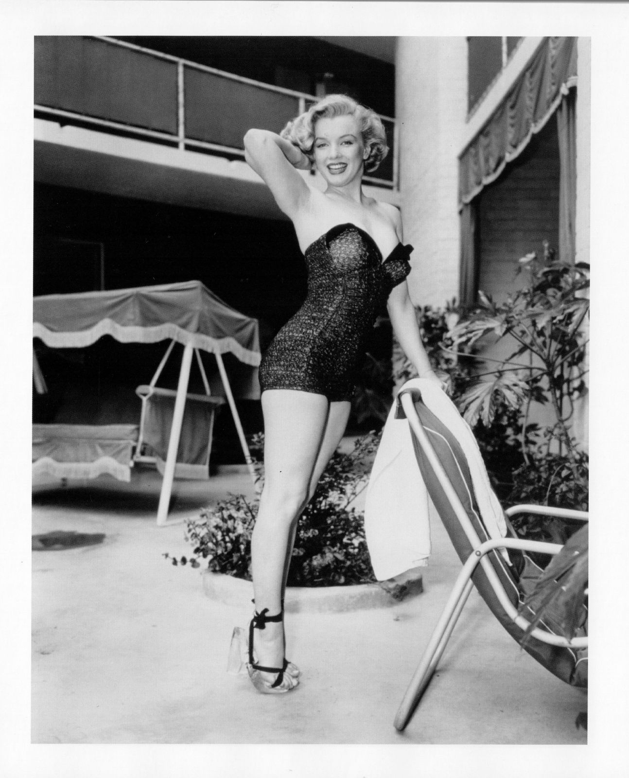 Frank Worth, Marilyn Monroe Posing Poolside, 1954