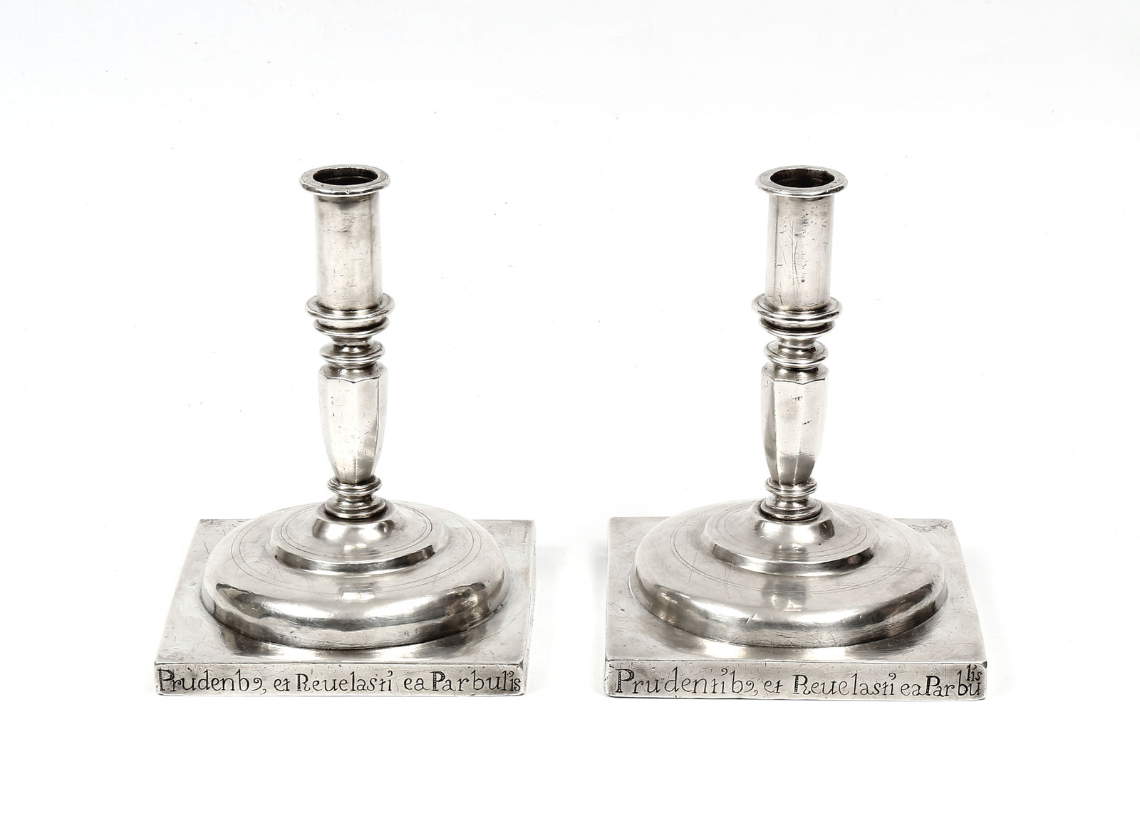 A pair of 17th century Portuguese silver candlesticks, Portugal; 17th century, later 1713 inscription