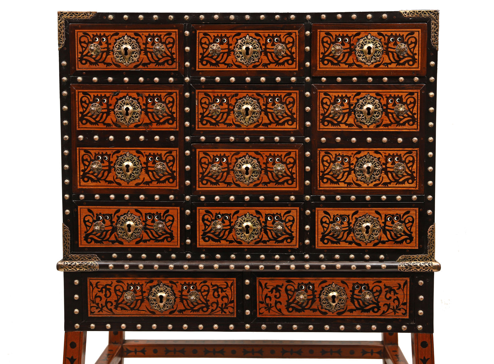 An Indo Portuguese Cabinet on Stand with the Jesuits Insignia , Goa, 17th century