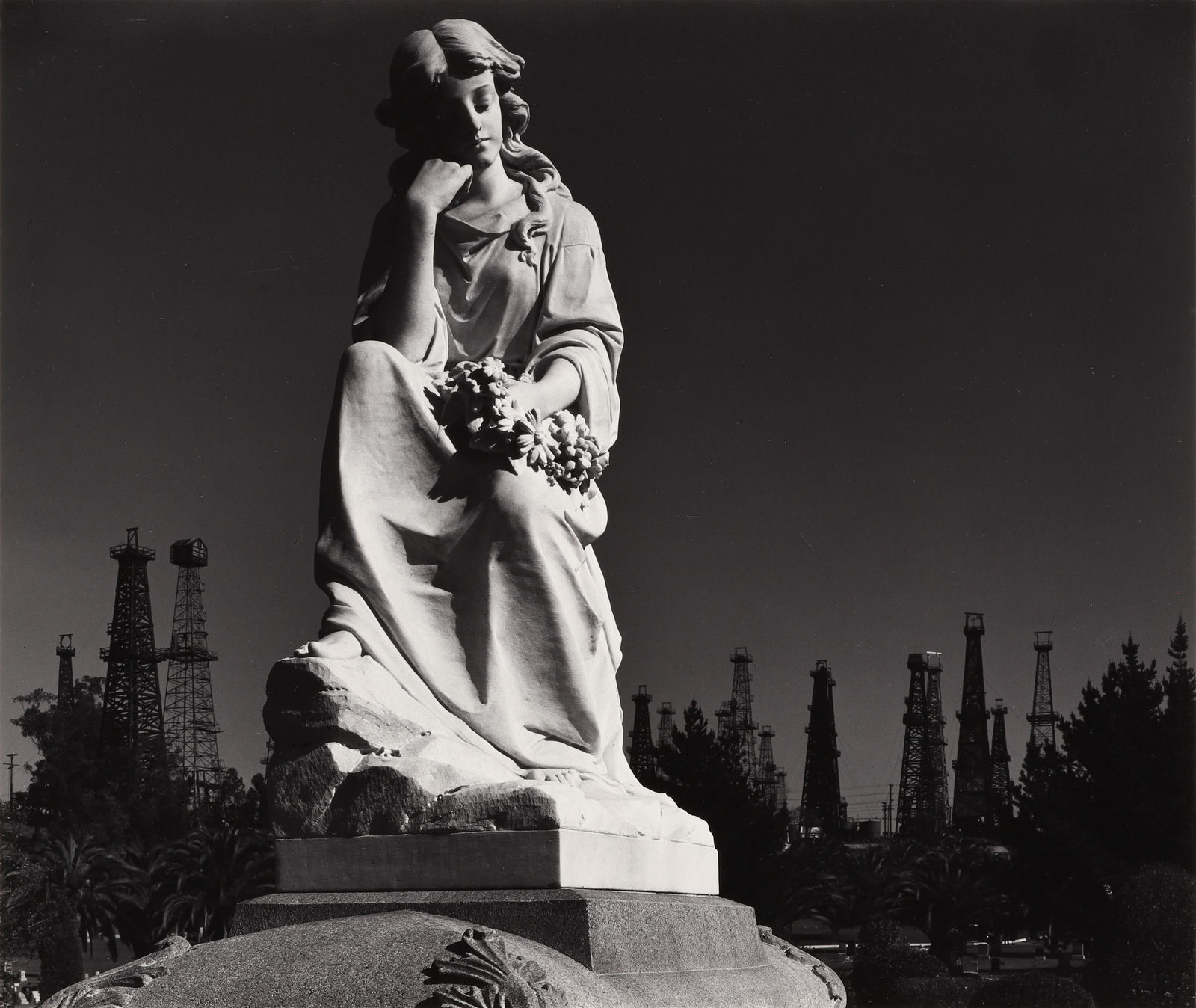 Ansel Adams, Cemetery Statue and Oil Derricks, Signal Hill, CA, 1939
