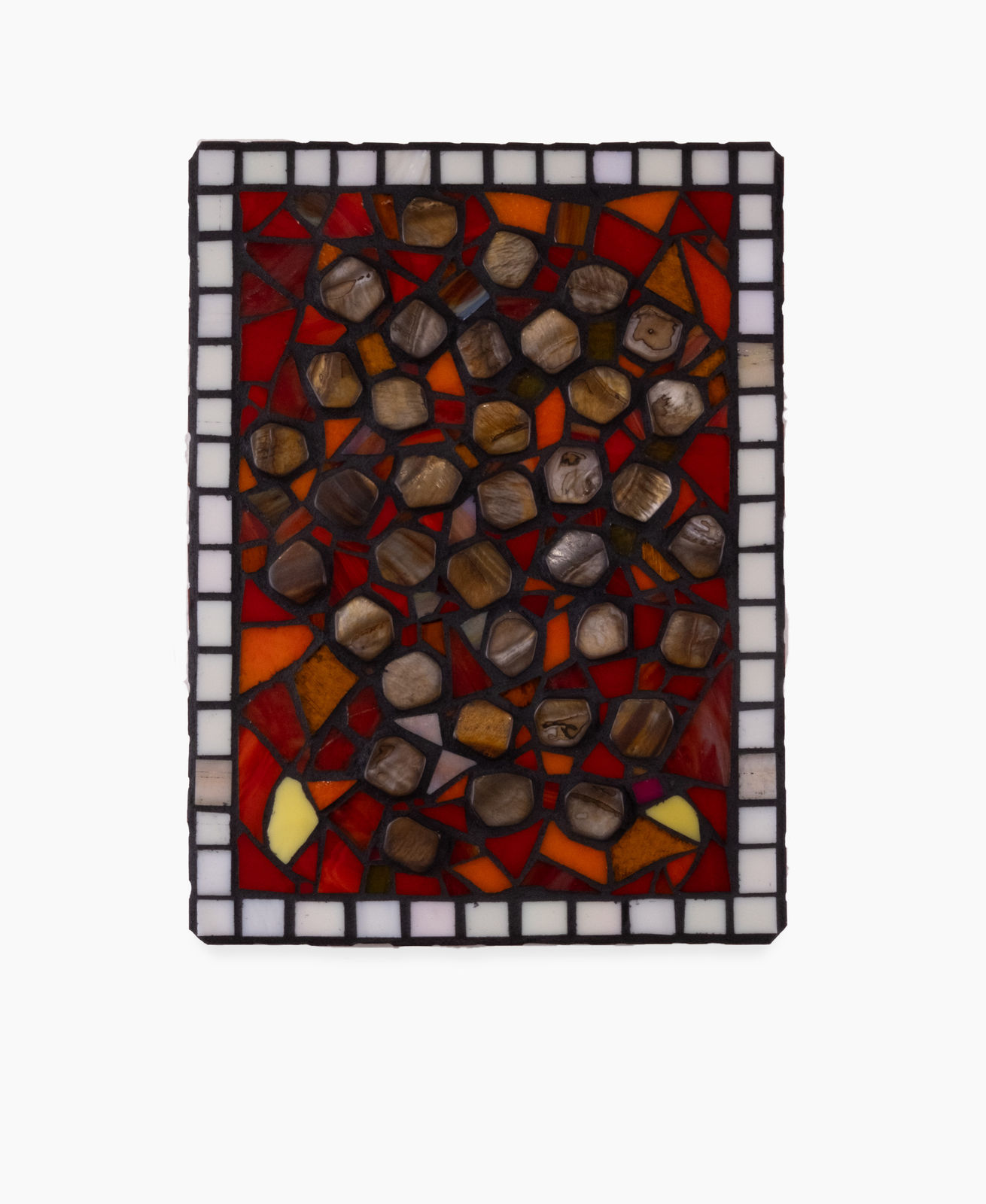 A glass mosaic by Leah Shirley featuring lots of small brown glass circles against a red glass mosaic background, with a white square border.