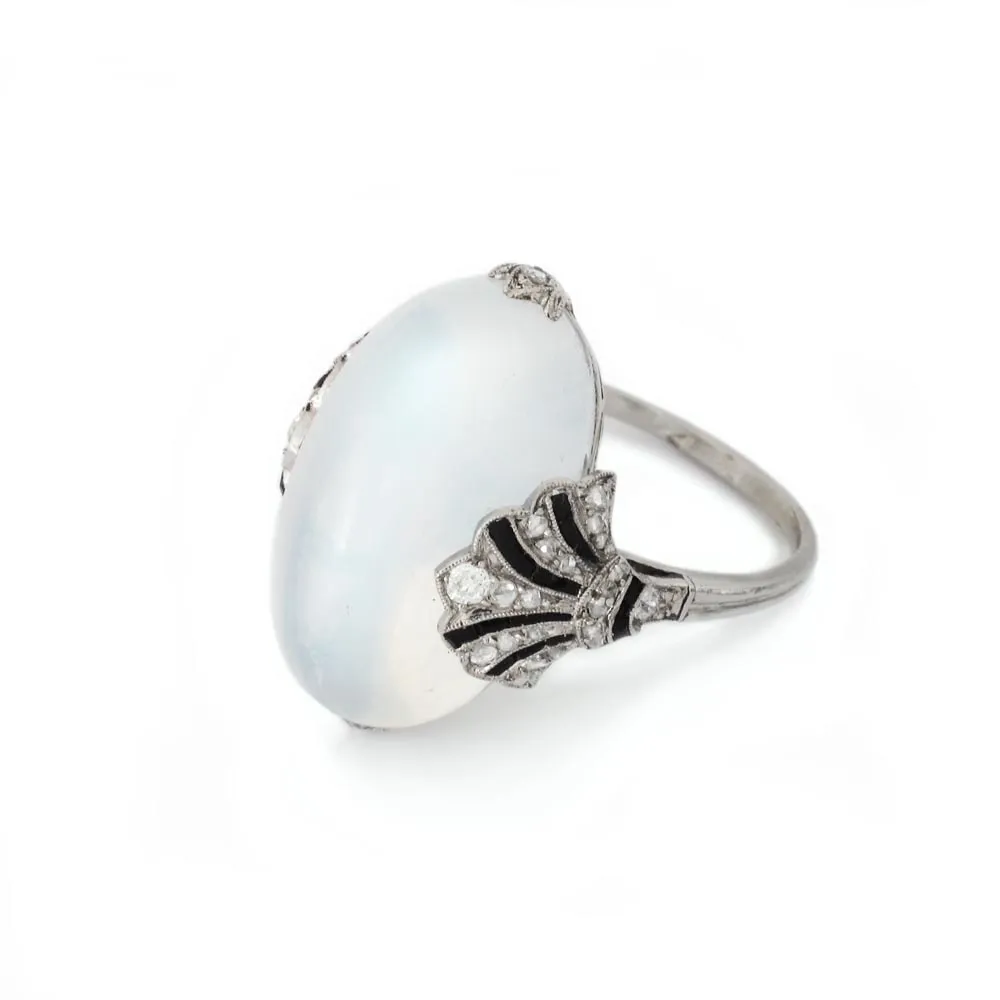 An Art Deco French Moonstone, Diamond and Onyx Ring, c. 1920