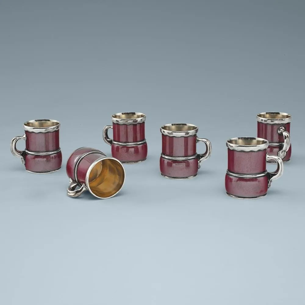 Tiffany & Co., A Set of Six American Silver and Patinated Copper Tots, c. 1879