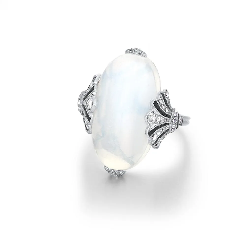 An Art Deco French Moonstone, Diamond and Onyx Ring, c. 1920