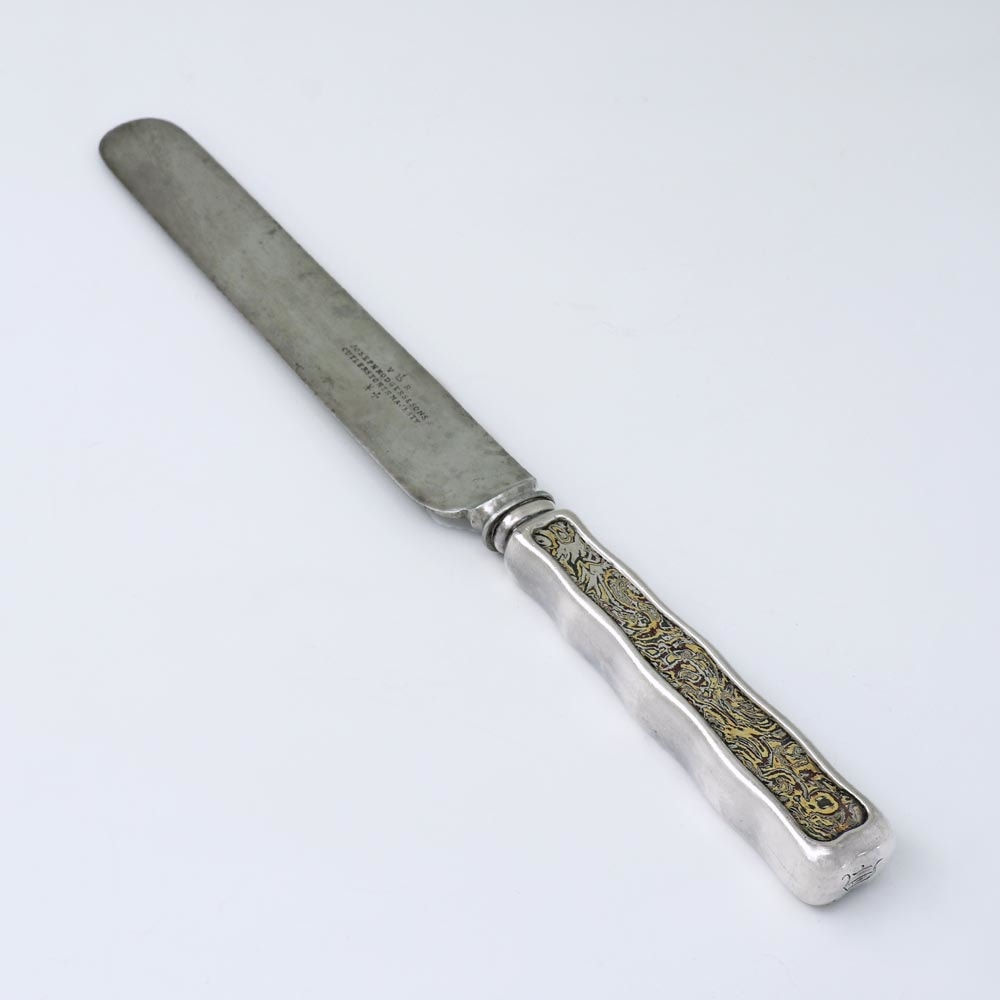 Tiffany & Co., A Set of Twelve Antique American Mokume Silver Knives, c. 1890