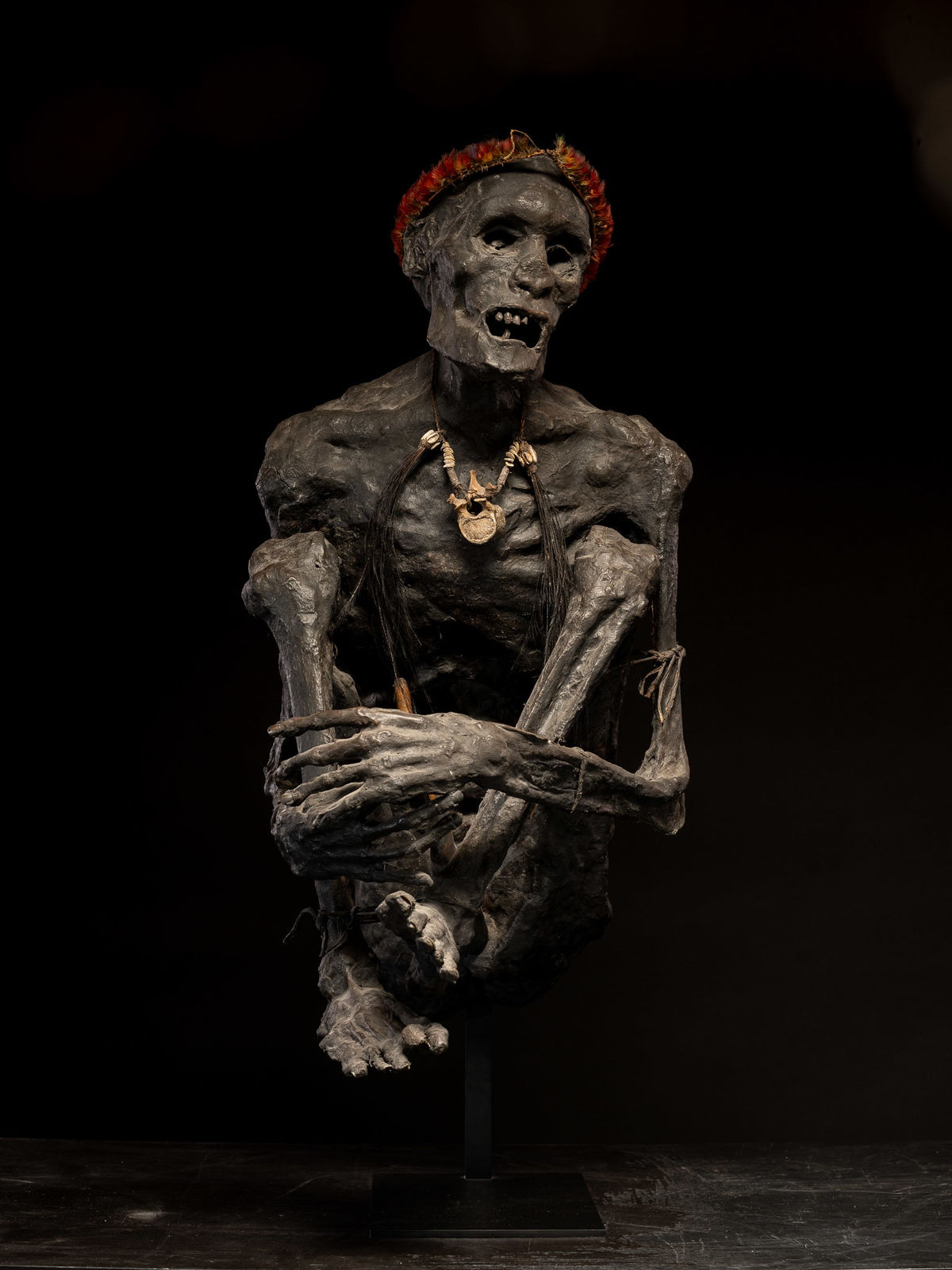 Sculptured model of a smoked Papua Mummie, papier mâché, 20th C, 1990's