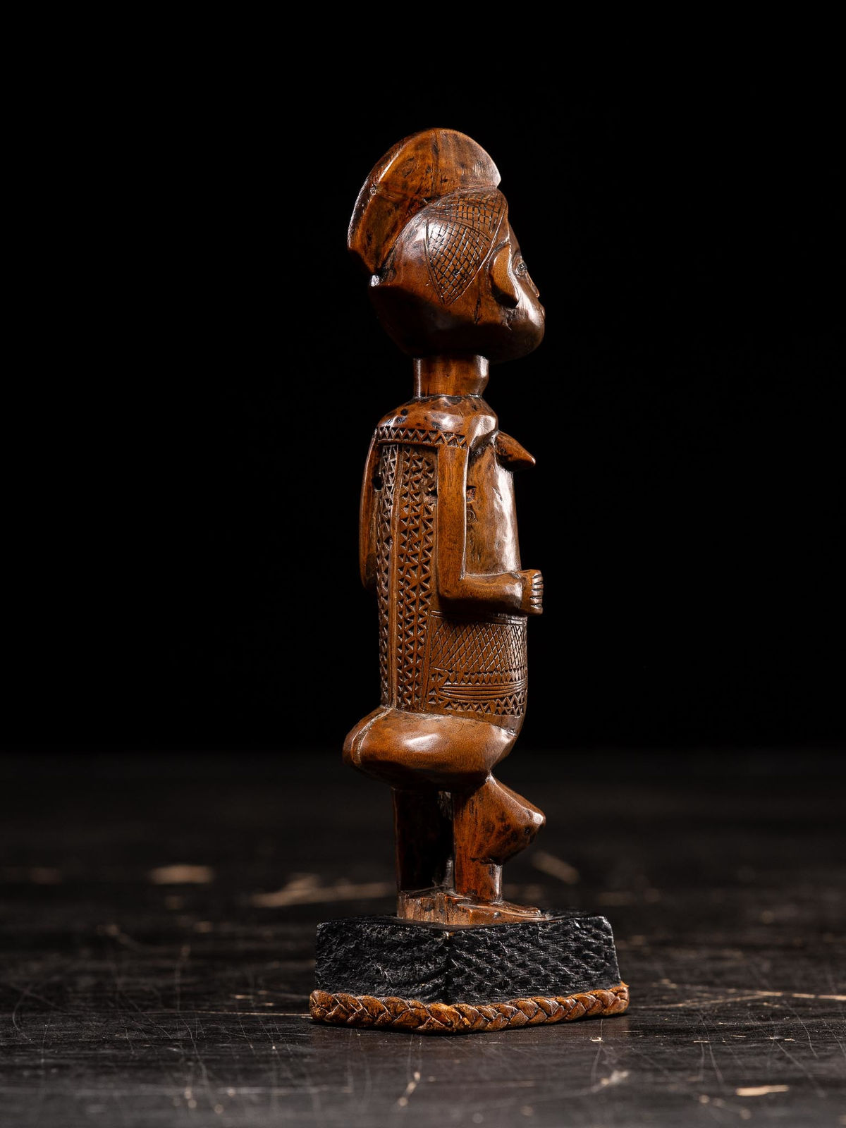 Female standing scarified Figure on old colonial stand, Bwende People, DRC, 1st half 20th C