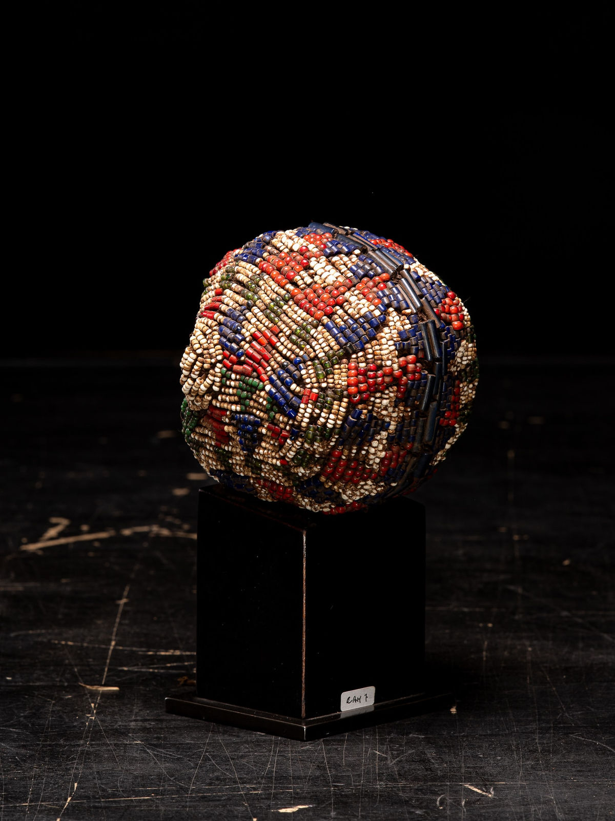 Bamileke Old Anthropomorphic Trophy Head embroidered with Murano White heart Glass Beads, Cameroon, 1st half 20th Century