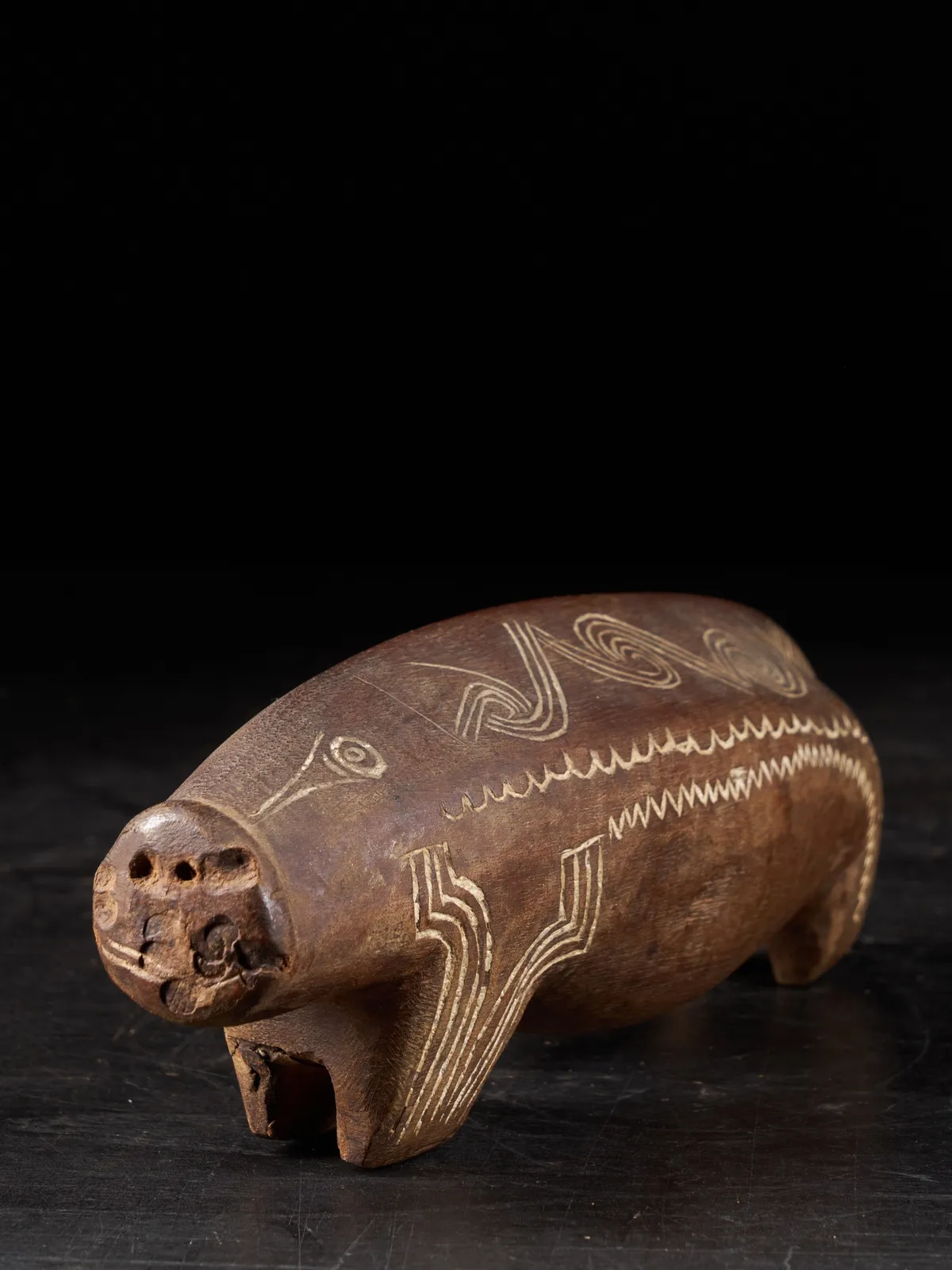 Massim Pig charme sculpture, Trobiant, first half 20th Century