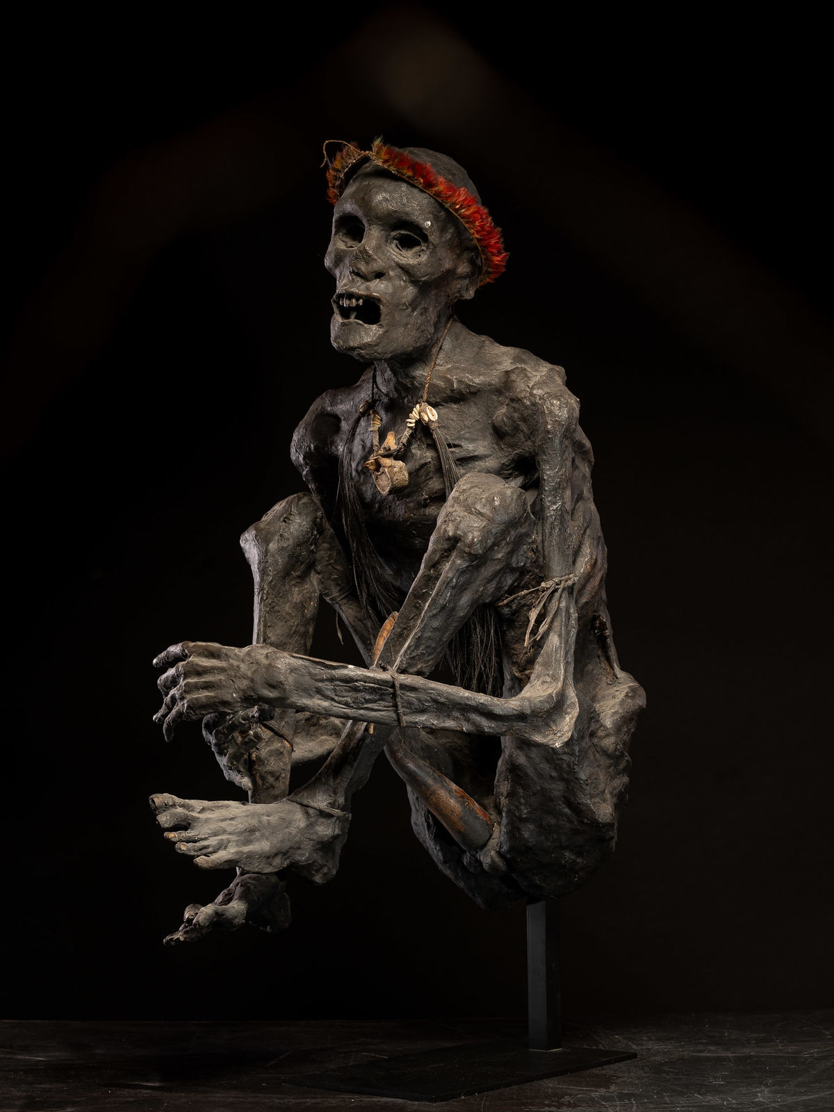 Sculptured model of a smoked Papua Mummie, papier mâché, 20th C, 1990's