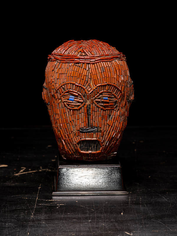 Bamileke Cult Head embroided with reddish-brown European Glassbeads.Bamileke People,Cameroon, 20th Century