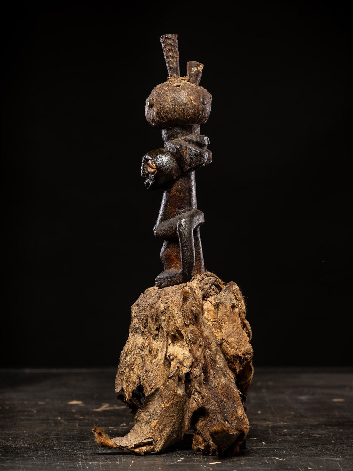Power figure with cauris inlaid eyes topped with small antilope horns. Kusu People, DRC, 1st half 20th C