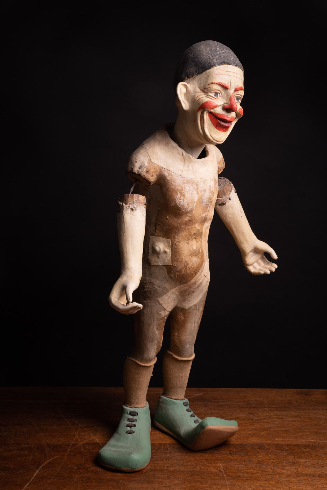 Antique Circus Clown with poseable arms and caracterful mysterious smile., 1st half 20th Century
