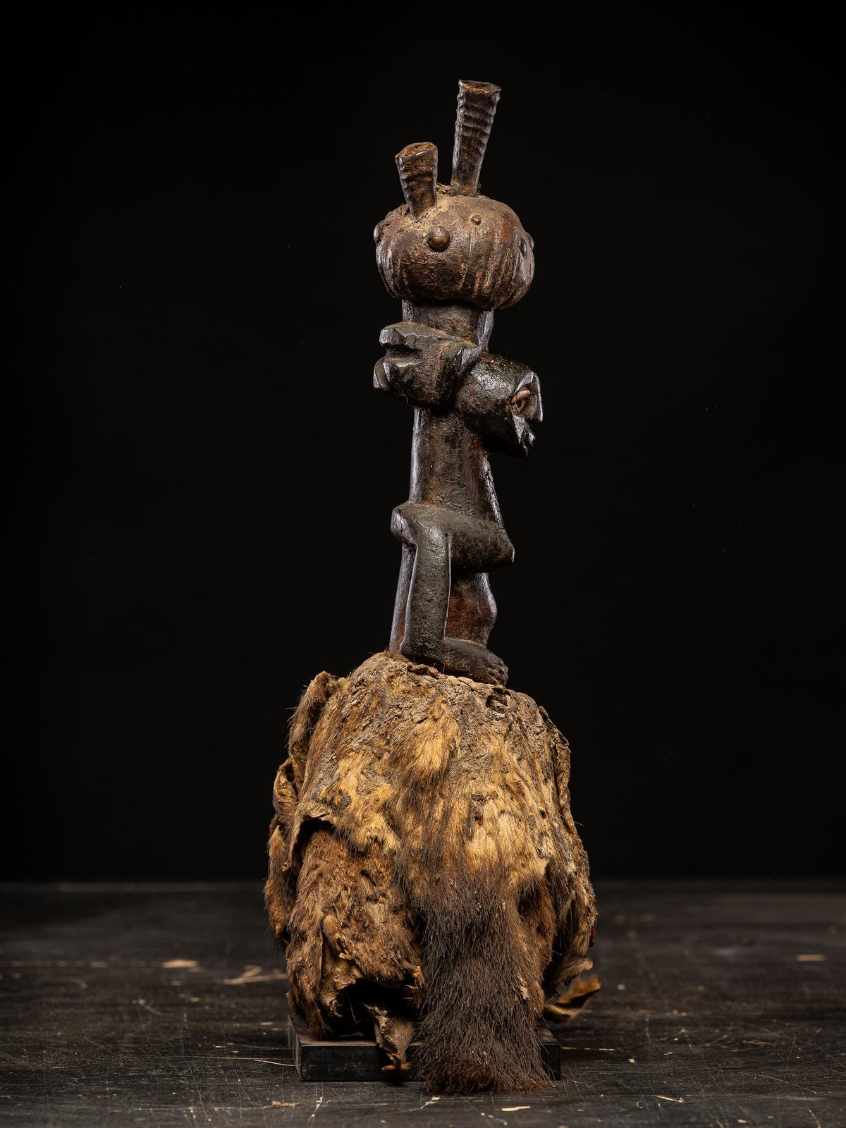 Power figure with cauris inlaid eyes topped with small antilope horns. Kusu People, DRC, 1st half 20th C