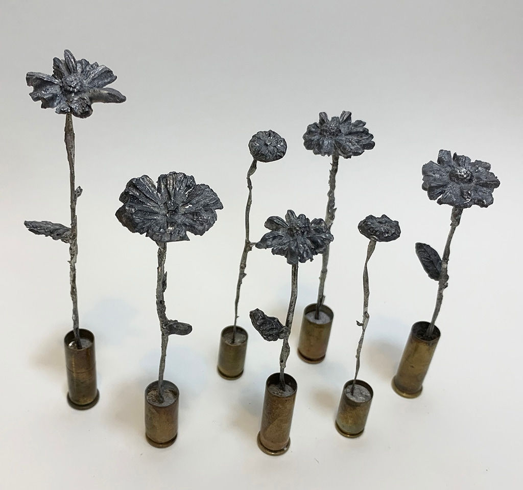 Jeremiah Jenkins sculptures of flowers growing out of lead bullets (set)
