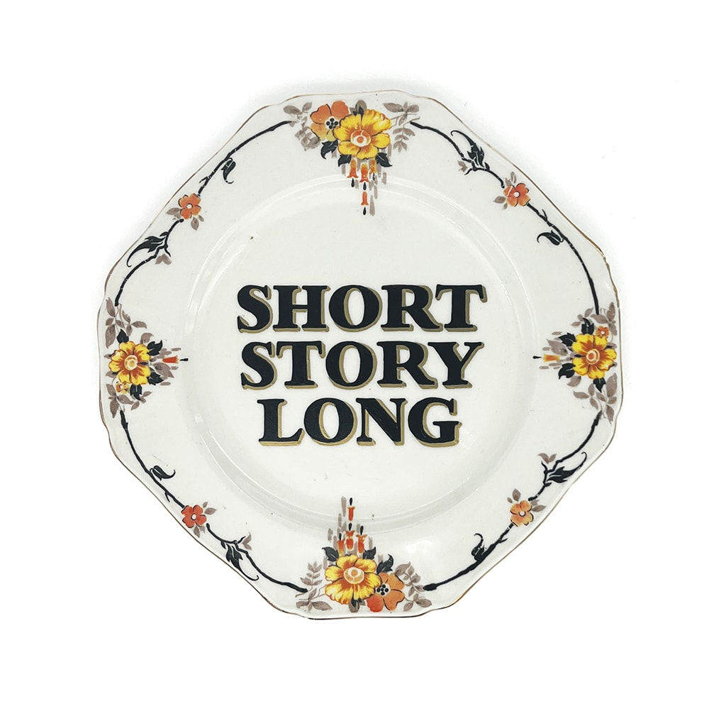 ceramic plates with words painted on them