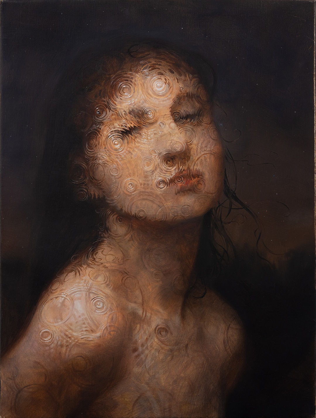 Portrait of a figure under water with rain droplets