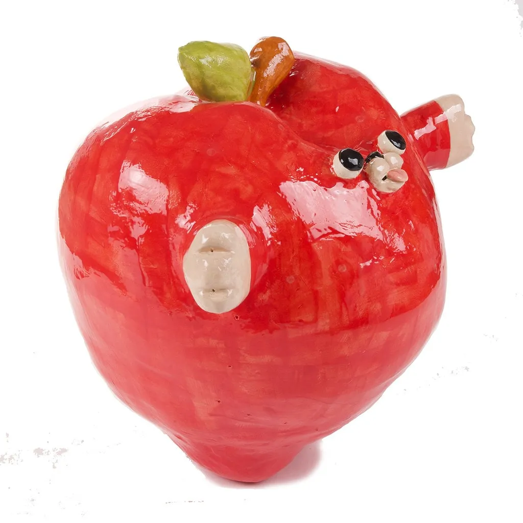 Katie Kimmel's ceramic sculpture of a red apple with a face and arms