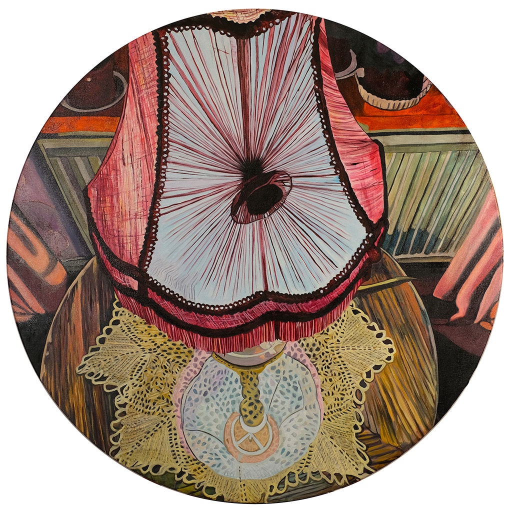 Circular painting of a distorted lamp on a wooden table from an aerial view