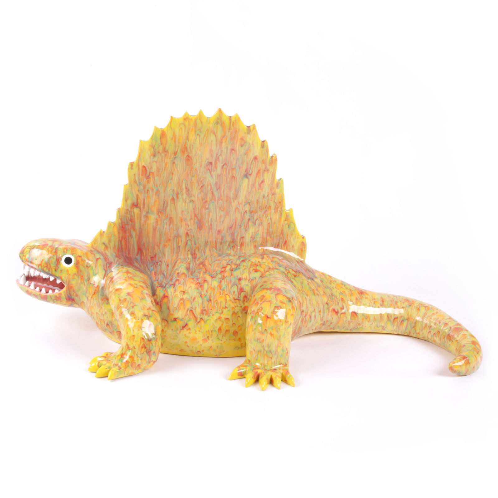 ceramic sculpture of a yellow prehistoric lizard